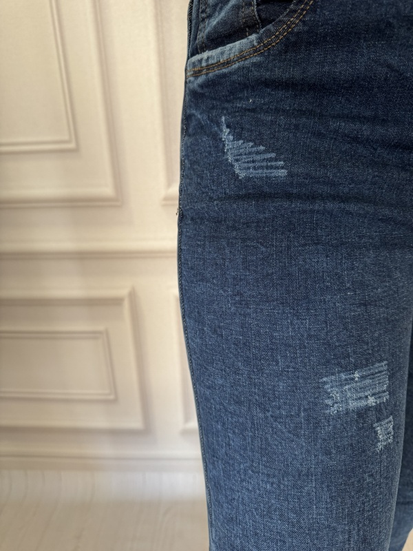 شلوار جین دمپا گشاد زنانه آبی روشن با زاپ روی ران