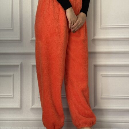 شلوار راحتی زنانه حوله ای کشسان رنگ قرمز آجری، مدل مچ دار و کمر تمام کش، با پارچه نرم و پشمی، فری سایز ۳۶ الی ۴۸