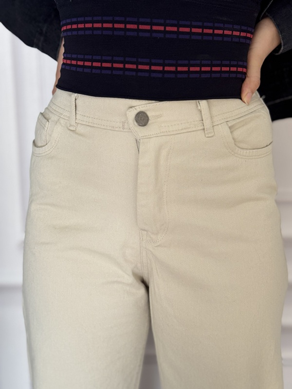 شلوار کتان بگ سنگشور شیری با جزئیات کمر و جیب جلویی