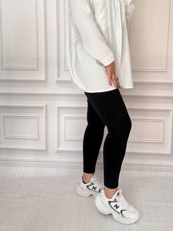 لگ نخی زنانه مشکی کشی و جذب، نمای بغل روی مانکن