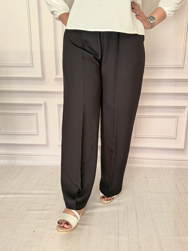 نمای جلویی شلوار مشکی نخ کبریتی بگ – تنخور آزاد و شیک