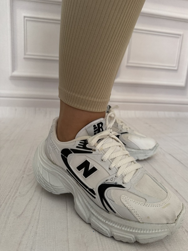 لگ زنانه کبریتی کرم با فیت جذب پایین ساق