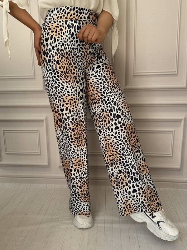 شلوار پارچه ای بگ زنانه طرح پلنگی مشکی کرمی نمای بغل