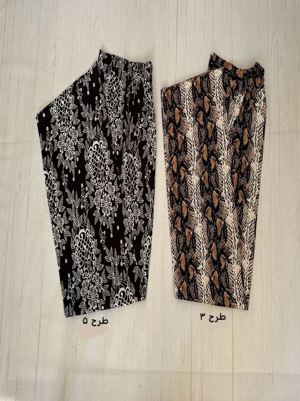 شلوار پارچهای بگ طرحدار گل-برگ-خزنده